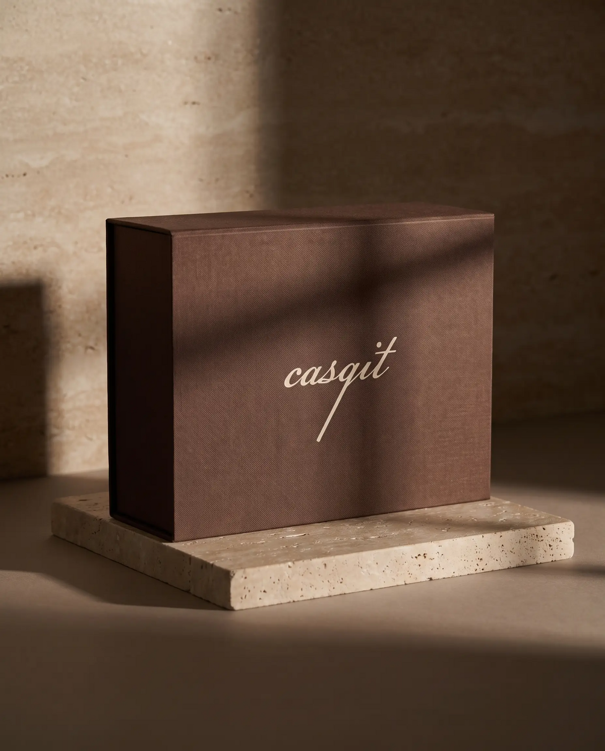 Closed Casqit signature box on stone