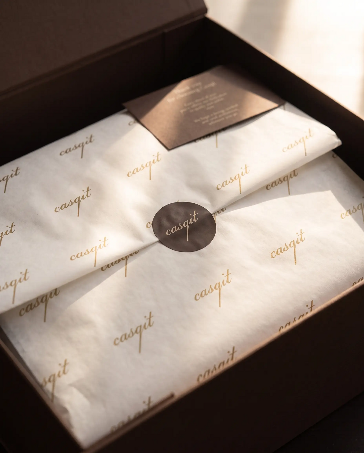Casqit tissue paper, seal and card